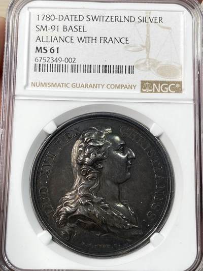 万国钱币拍卖第064期 - NGC MS61 1780年法国路易十六世与巴塞尔结为全新且稳固的联盟纪念银章 高浮雕浓郁黑彩罕见品种