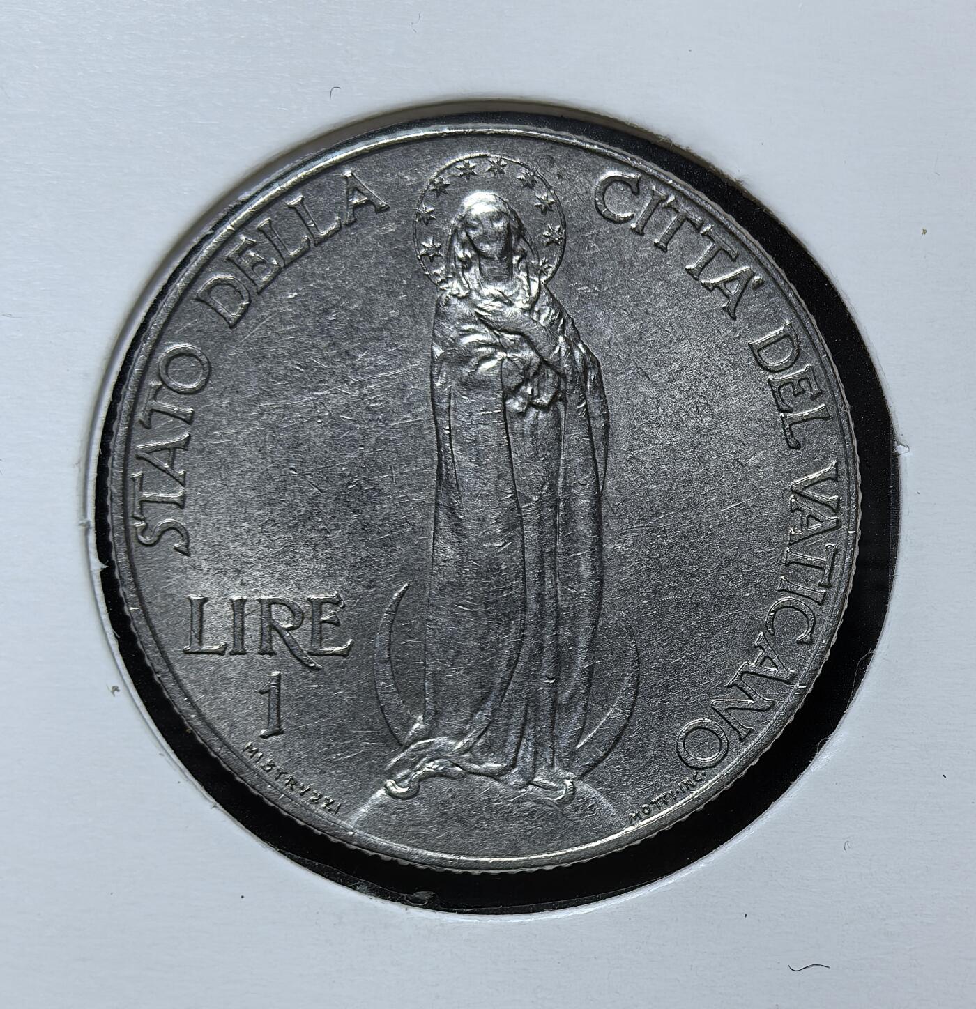 外国优质银币克朗币纪念章，每周六晚九点倒数截拍，满百包邮可寄存，持续收拍 梵蒂冈城国1937年1 里拉，由教宗庇护十一世时期铸造，币面为圣母像，是梵蒂冈主权货币体系与天主教信仰的实物见证。