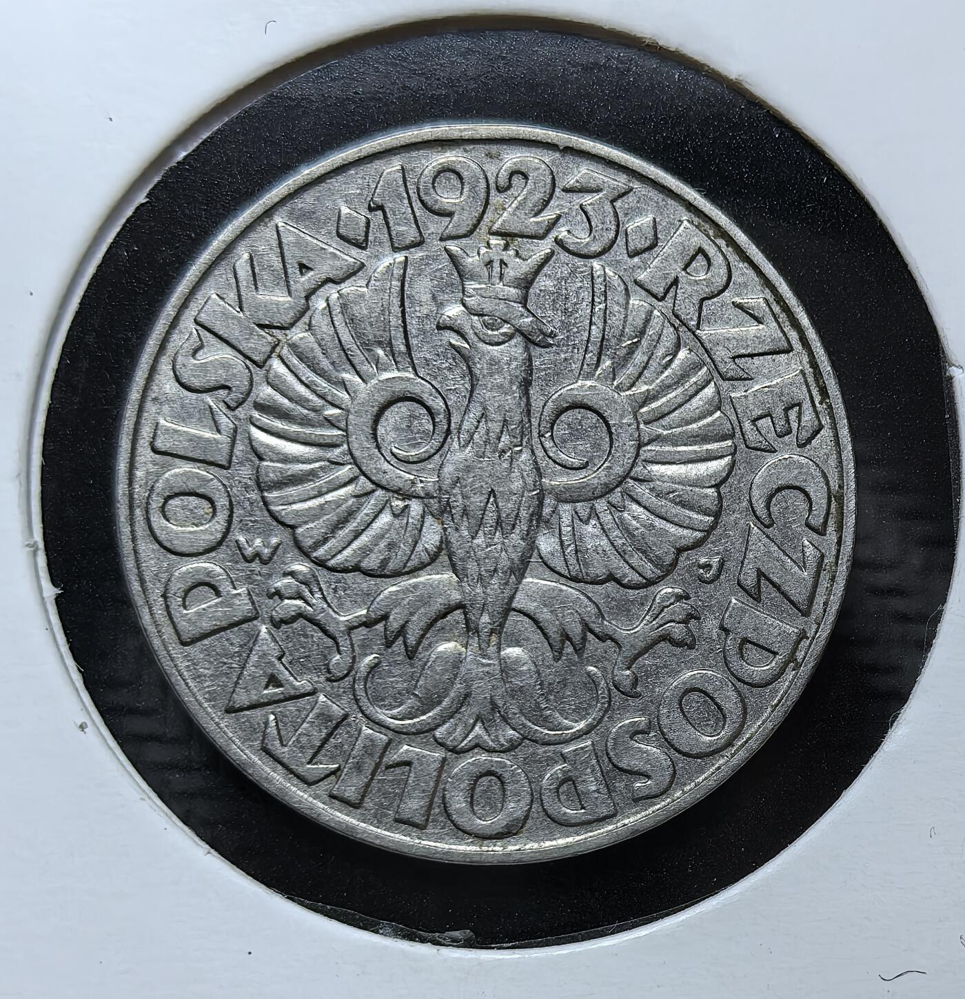 外国优质银币克朗币纪念章，每周六晚九点倒数截拍，满百包邮可寄存，持续收拍 波兰第二共和国1923年50格罗希，币面铸波兰白鹰国徽，是一战后波兰复国初期的流通辅币，见证了波兰重建主权、稳定货币体系的历史。