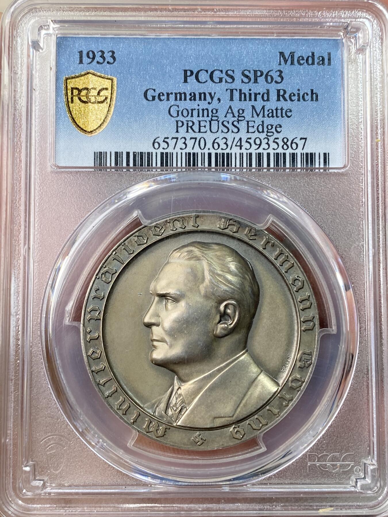 万国钱币拍卖第064期 PCGS SP63 1933年德国民族社会主义工人党赫尔曼·戈林当选普鲁士总理并成立“盖世太保”纪念银章 顶级高浮雕品相 与大事记为统一规格和雕模师 原味天鹅绒彩极美收藏级 PC冠军分（原图请私信后台或自行查询官网）