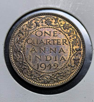 外国优质银币克朗币纪念章，每周六晚九点倒数截拍，满百包邮可寄存，持续收拍 - 带光英属印度1942年1/4 安娜铜币，正面为乔治六世国王像，背面饰花叶纹与面值，是二战时期英属印度的流通辅币，见证了英国殖民印度的历史。