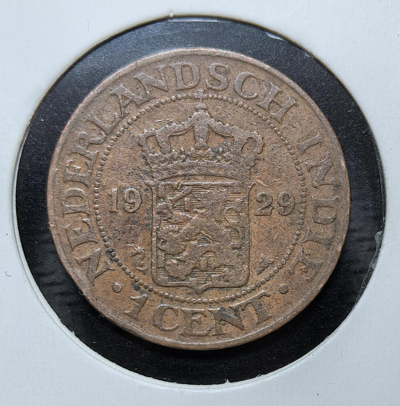 外国优质银币克朗币纪念章，每周六晚九点倒数截拍，满百包邮可寄存，持续收拍 荷属东印度1929年1分铜币，币面印有荷兰王室纹章。它是荷兰殖民统治时期的流通货币，见证了荷兰在东南亚殖民地的历史时期与官方货币体系。