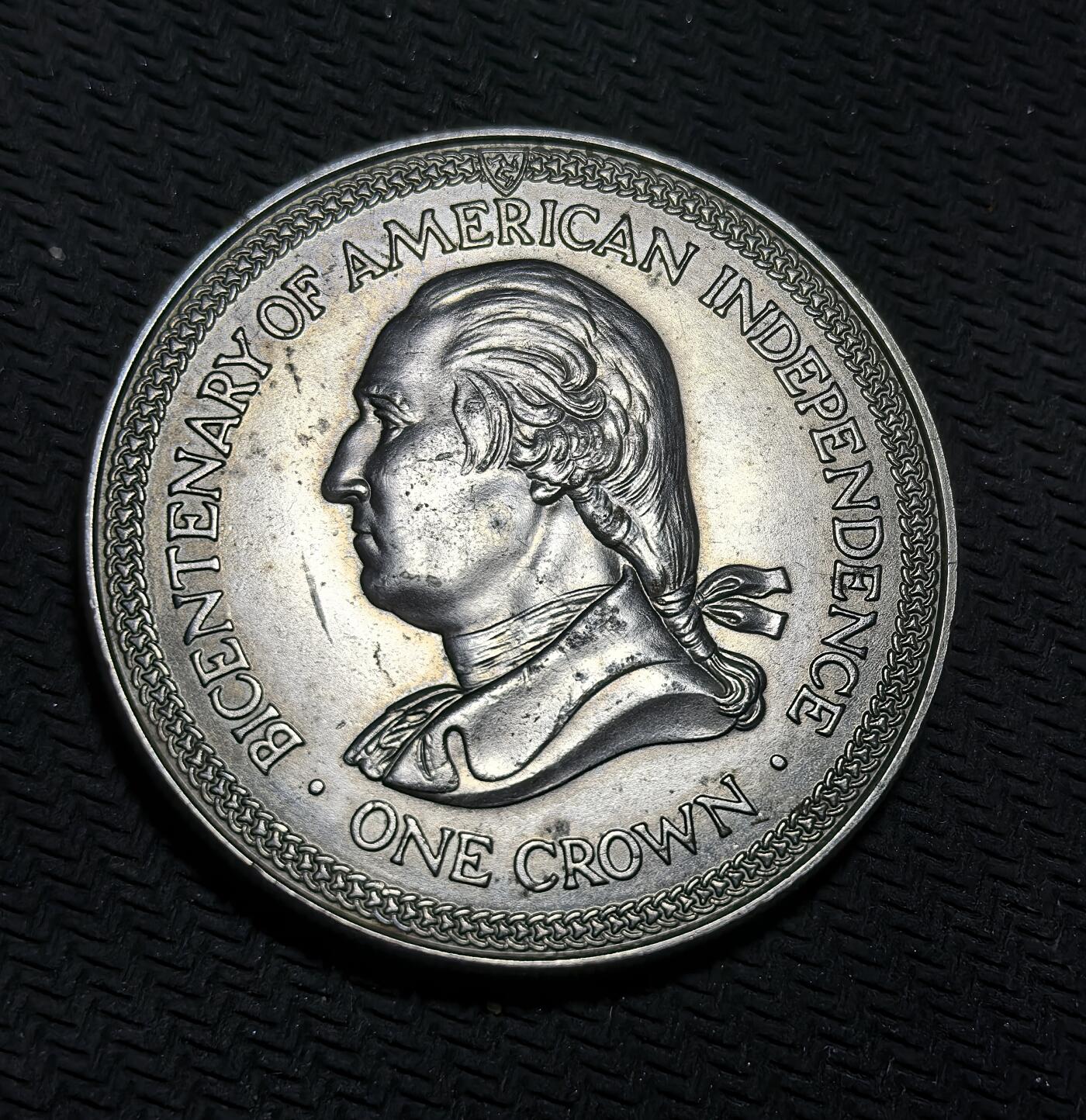 外国优质银币克朗币纪念章，每周六晚九点倒数截拍，满百包邮可寄存，持续收拍 马恩岛1976年美国独立 200 周年 1 克朗纪念币，正面是伊丽莎白二世肖像，背面为乔治・华盛顿像，是英属领地纪念美英历史的跨界藏品。