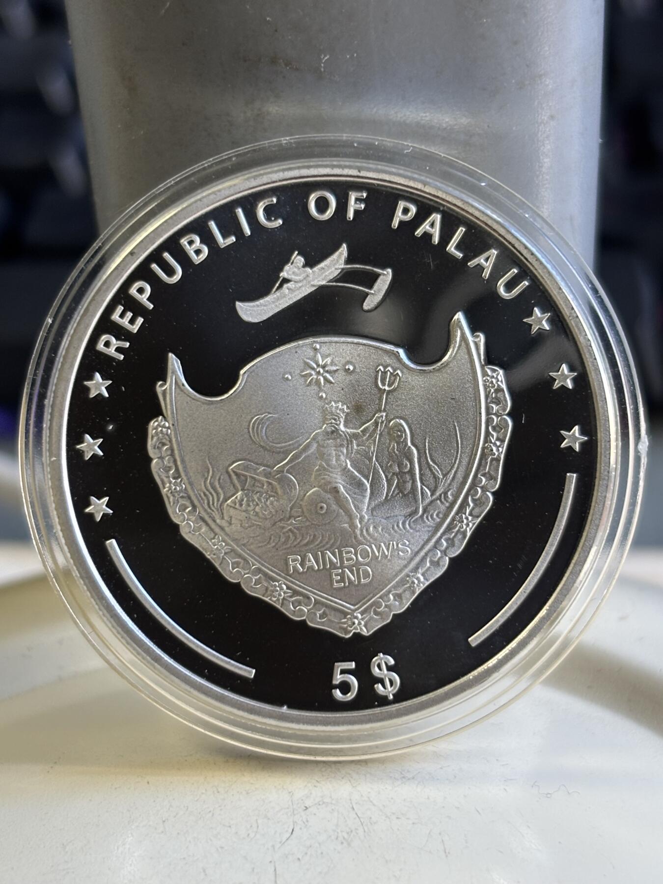 第196期拍卖 帕劳2007年珍珠系列镶嵌天然黄珍珠精制纪念银币，925银，25克，发行2500枚，有氧化，