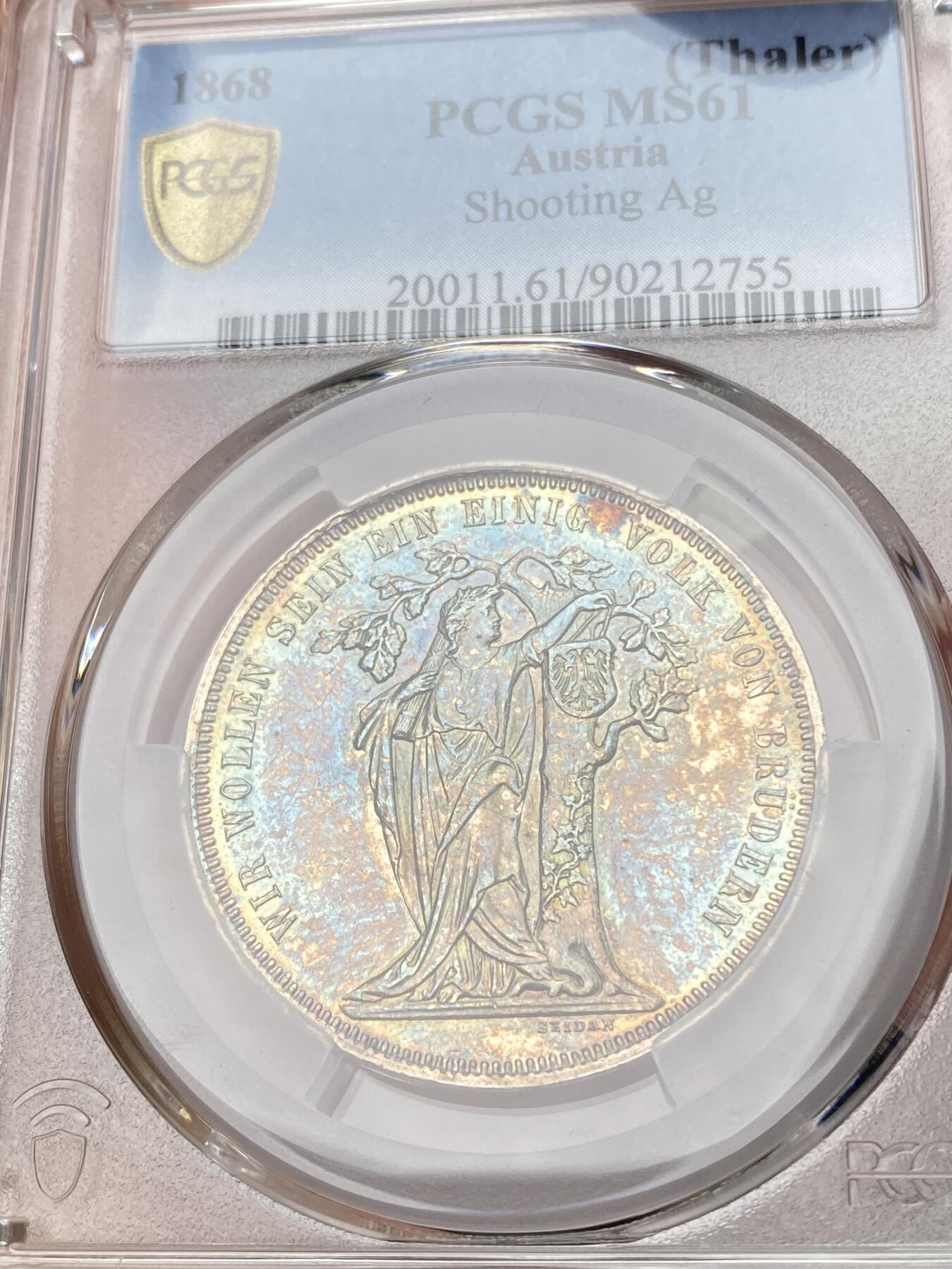 万国钱币拍卖第064期 PCGS MS61 1868年奥地利维也纳第三届德意志联邦射击节橡树泰勒 女神与橡树的完美结合 单年版奥射稀有名誉品种 绚丽渐变式七色虹彩包浆收藏级品质