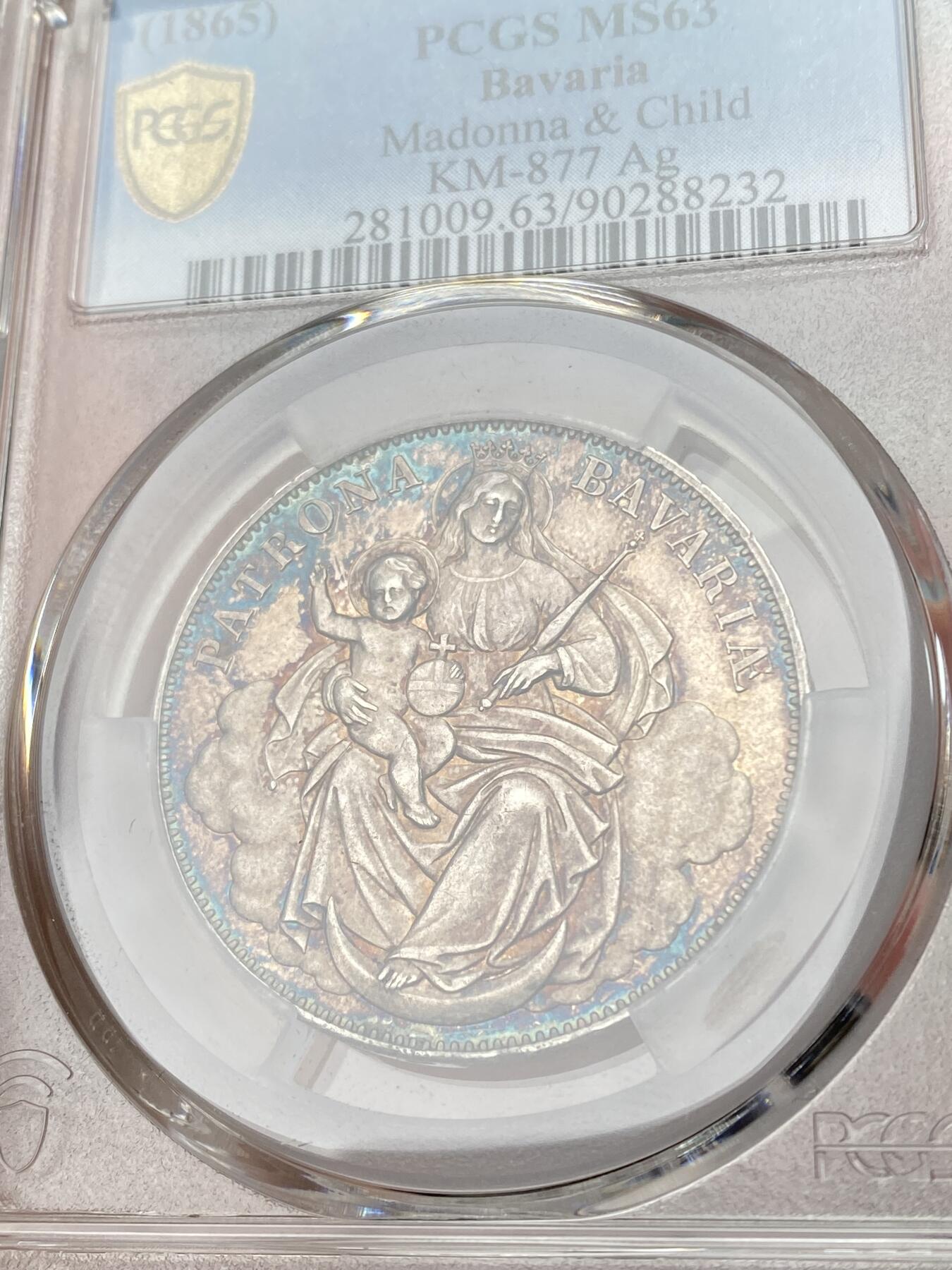 万国钱币拍卖第064期 PCGS MS63 1865年德国巴伐利亚路德维希二世圣母抱婴流通1泰勒 无纪年版本相对稀少 原味欧洲孔雀蓝色调浓郁老彩包浆环绕收藏级品质
