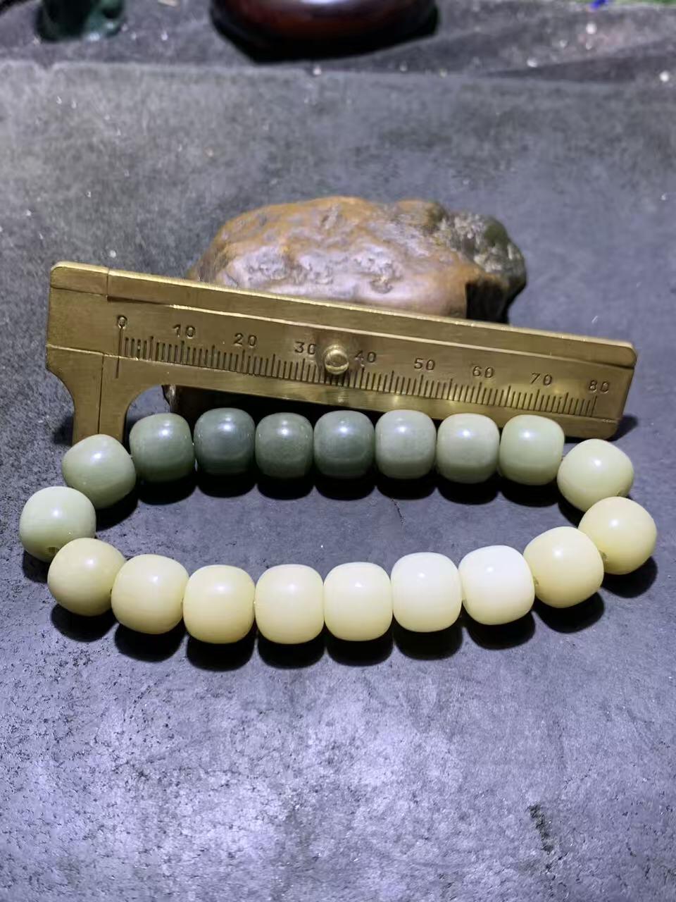 精美多宝渐变色菩提根手串绕指揉糖果色老型桶珠文玩念珠手链混色珠单圈手链一条，