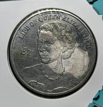 外国优质银币克朗币纪念章，每周六晚九点倒数截拍，满百包邮可寄存，持续收拍 - 阿森松岛2012年纪念伊丽莎白二世登基钻禧2镑纪念币，正面呈现女王不同时期肖像，背面展现其青年形象，由英属海外领地发行，致敬女王一生与君主制传承。