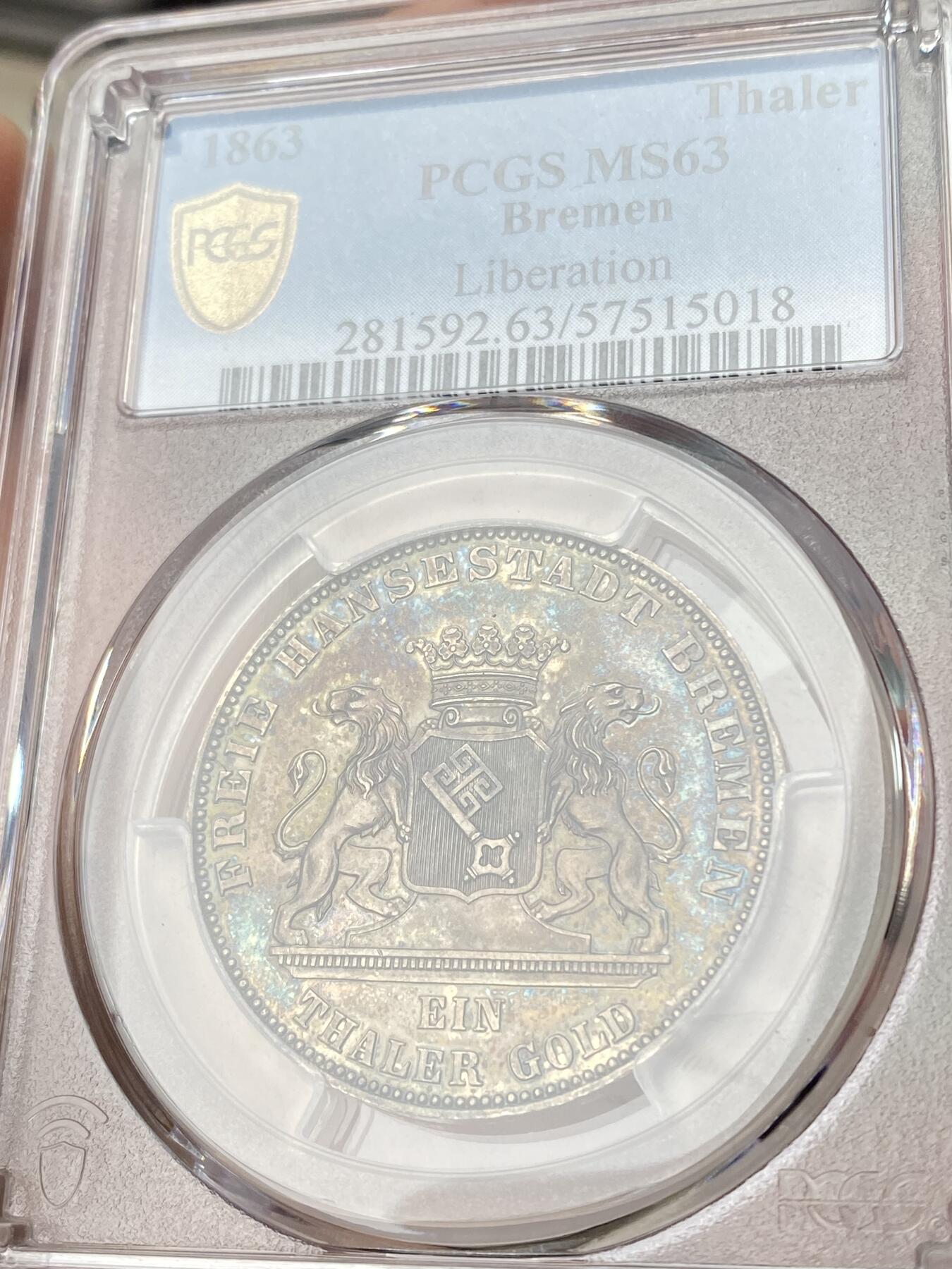 万国钱币拍卖第064期 PCGS MS63 1863年德国不莱梅解放五十周年纪念1泰勒 不莱梅三款双狮联合泰勒中发行量最少的一款 仅铸造2W枚且充分流通 好品难寻 浓郁欧陆五彩裹身极美收藏级