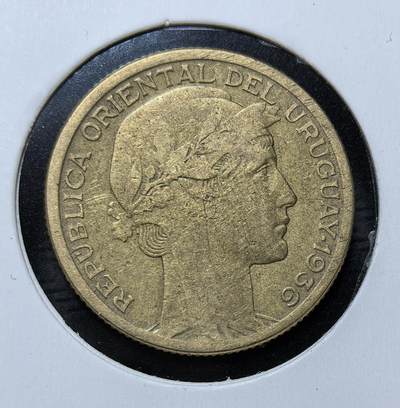 外国优质银币克朗币纪念章，每周六晚九点倒数截拍，满百包邮可寄存，持续收拍 - 乌拉圭共和国1936年10分铜币，正面为自由女神像，背面是美洲豹与旭日图案，是乌拉圭近代民族国家建设时期的流通币，彰显本土自然与国家象征。