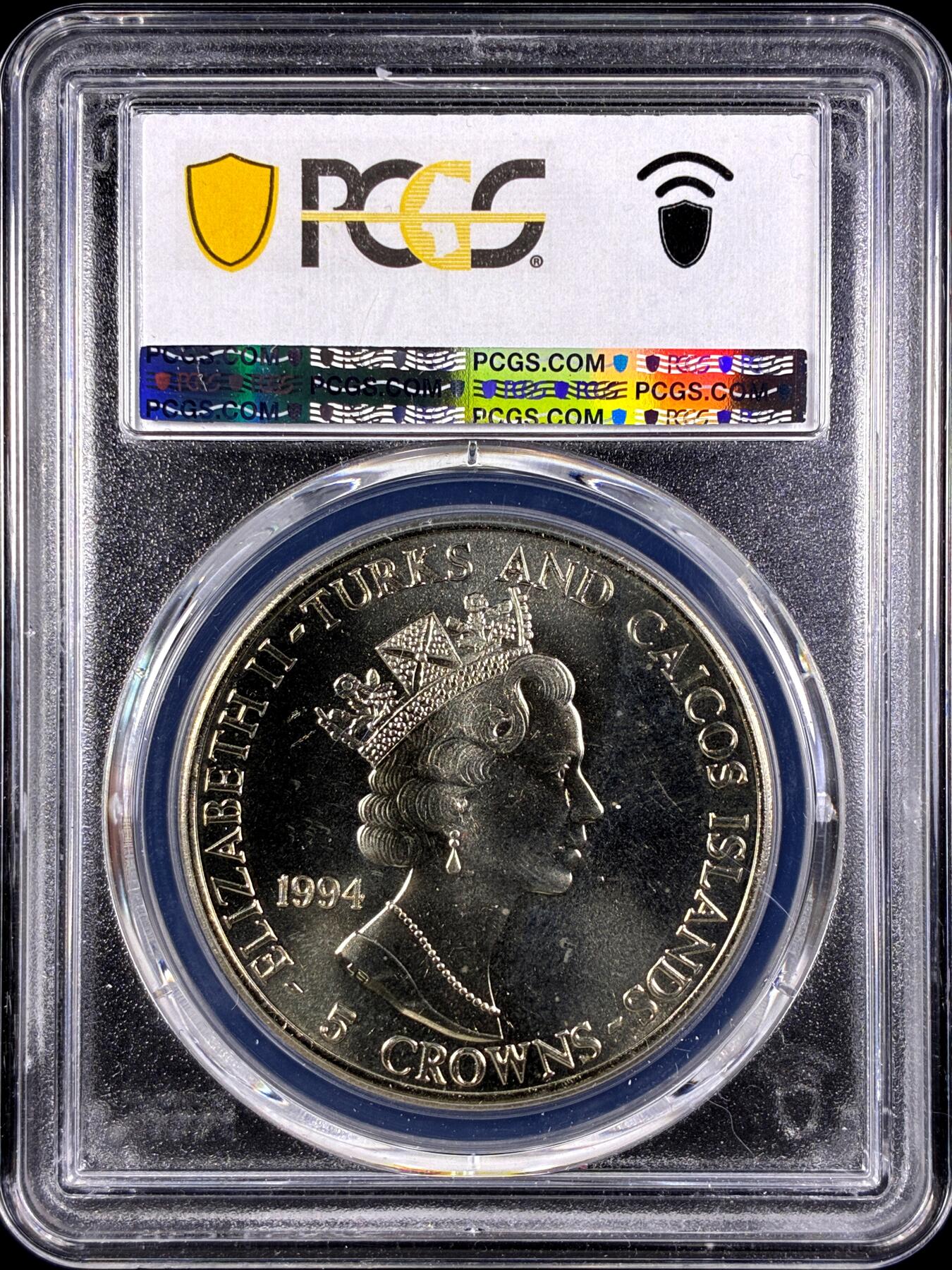 【雨安】【直播拍卖】【第0131期-评级币章】2026-04-04 周六 19:30 (金价1060, 银价18.08)  [评级现代] Turks and Caicos Islands 特克斯和凯科斯群岛 5克朗 1994年 美国五星上将奥马尔·布拉德利  PCGS-MS67