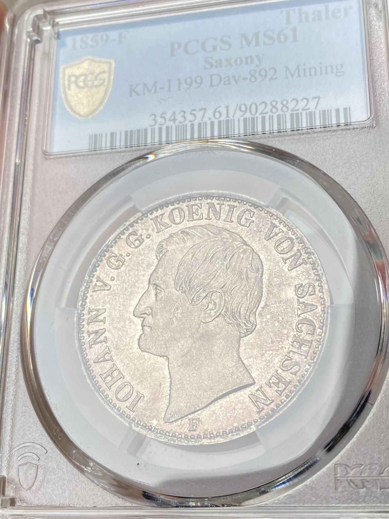 万国钱币拍卖第064期 PCGS MS61 1859年德国萨克森矿业祈祷流通1泰勒 早期经典双矿工护盾系列 极具特色的玫瑰环彩令人过目难忘