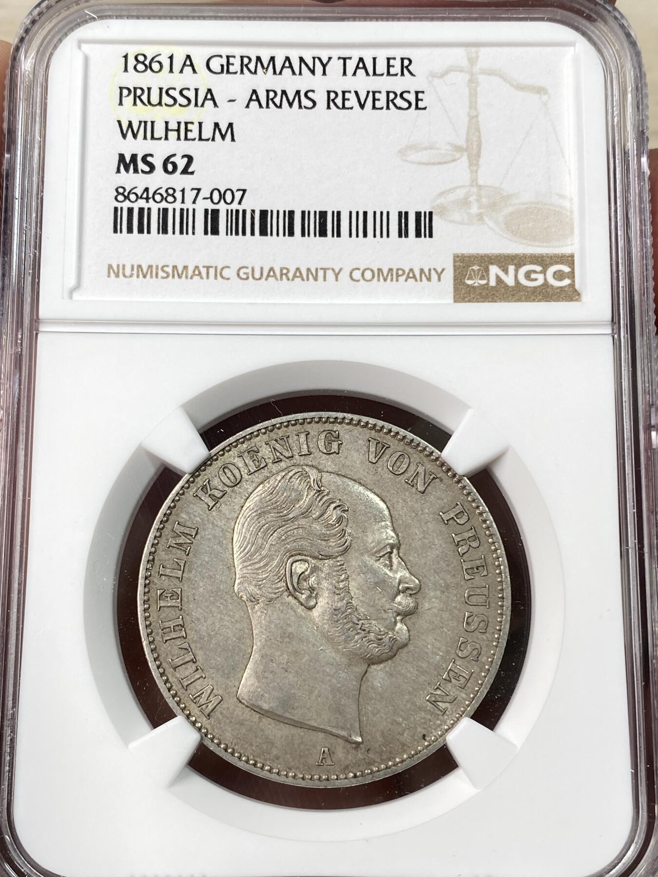 万国钱币拍卖第064期 NGC MS62 1861年德国普鲁士威廉一世流通离冠鹰1泰勒 威一加冕首年 原味德式淡彩环绕收藏级 好品越发稀少