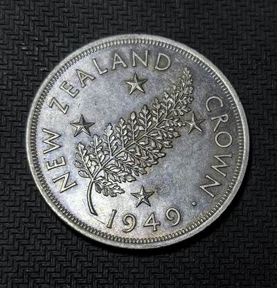 外国优质银币克朗币纪念章，每周六晚九点倒数截拍，满百包邮可寄存，持续收拍 - 新西兰1949年乔治六世克朗银币，背面银蕨与南十字星是国家象征，为纪念乔治六世在位末期发行，见证英联邦殖民历史与新西兰货币文化。