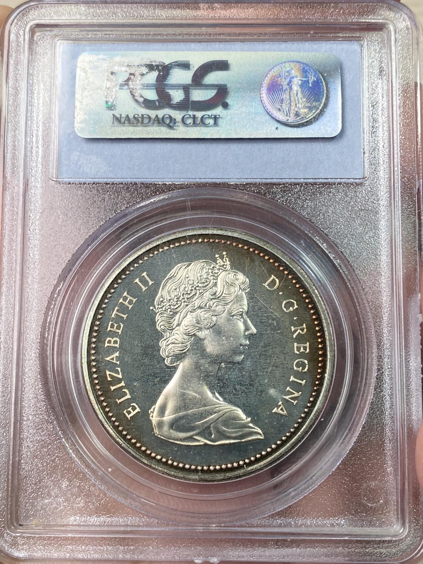 万国钱币拍卖第064期 PCGS SP68 1971加拿大伊丽莎白二世不列颠哥伦比亚省百年纪念银币 加拿大皇家造币厂铸 镜面七彩极美 （评级盒正面左上角破损）