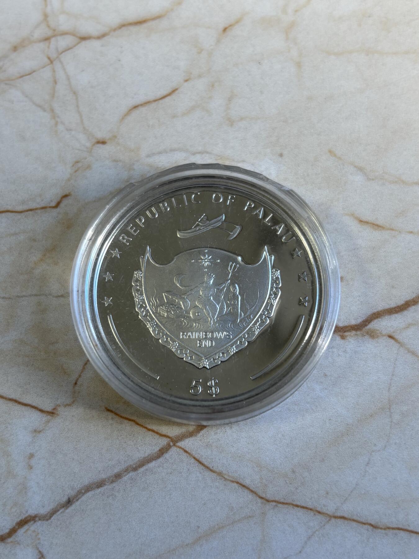 第196期拍卖 帕劳2010年麦金利山脉与花卉系列彩色纪念银币，925银，25克，塑料盒有破