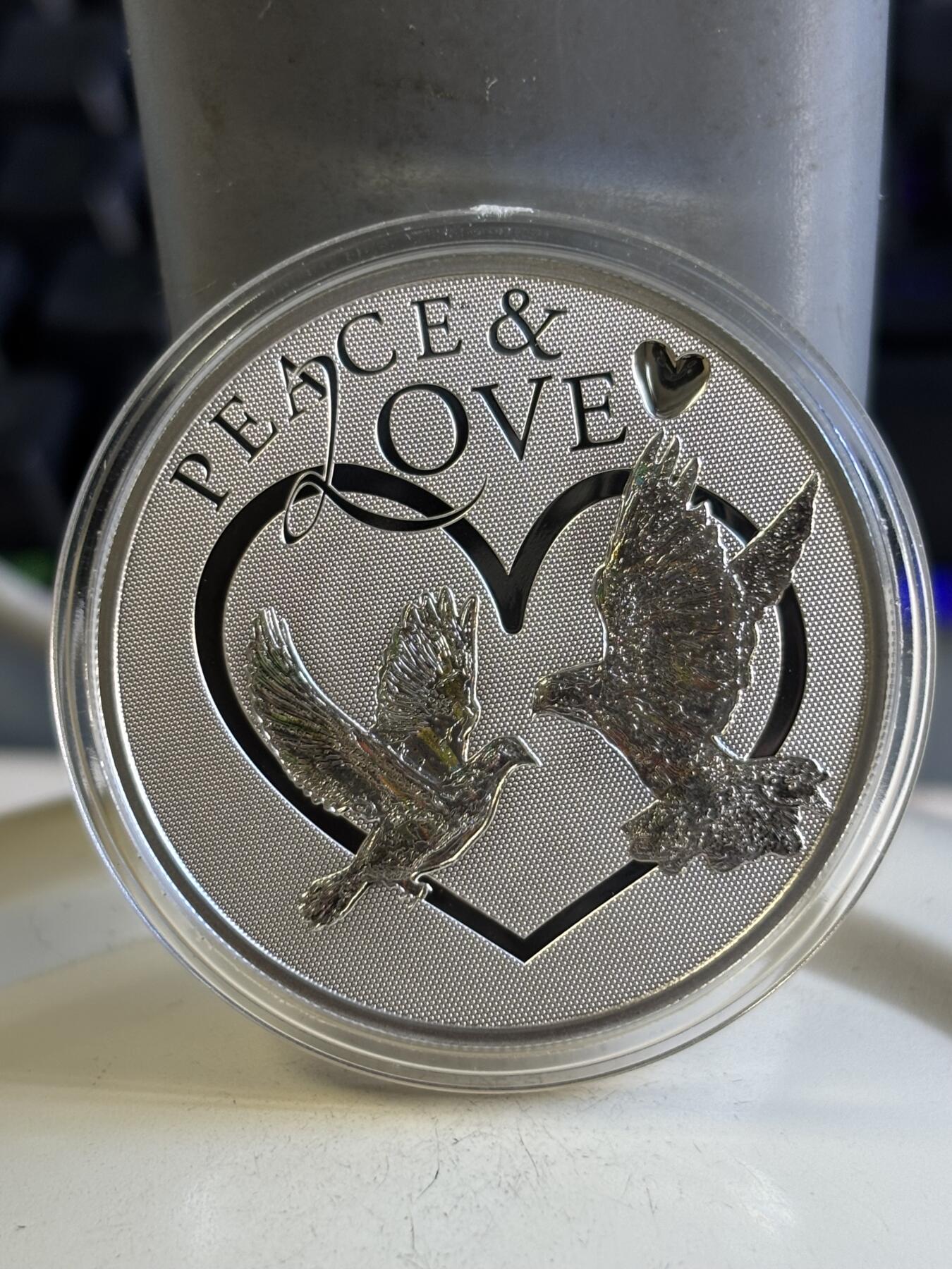 第196期拍卖 托克劳2012年和平与爱幻彩纪念银币，925银，25克，发行2500枚