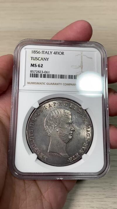 万国钱币拍卖第064期 NGC MS62 1856年意大利托斯卡纳4菲奧里尼大银 好品不多见的意系主币大银 背面纹章设计极其华丽 全深打车轮转光 原味欧陆五彩倒影包浆收藏级状态