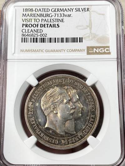 万国钱币拍卖第064期 - NGC PFD 1898年德国德皇威廉二世与皇后奥古斯塔访问巴勒斯坦期间为圣城耶路撒冷新教救赎者教堂落成典礼纪念精制银章 镜面喷砂极美香槟金彩罕见品种