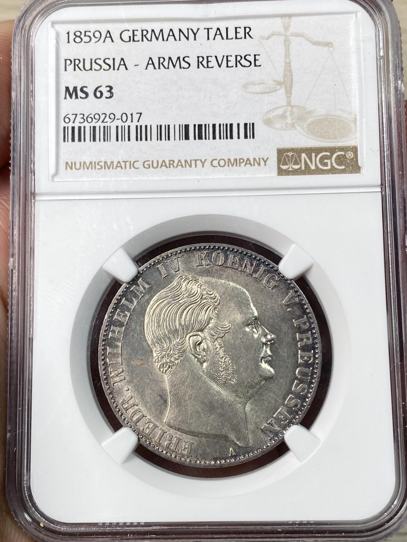 万国钱币拍卖第064期 NGC MS63 1859年德国普鲁士威廉四世离冠鹰流通1泰勒 欧陆淡五彩环绕 打制极其锋利隔着盒子仿佛也能感受到其割手感