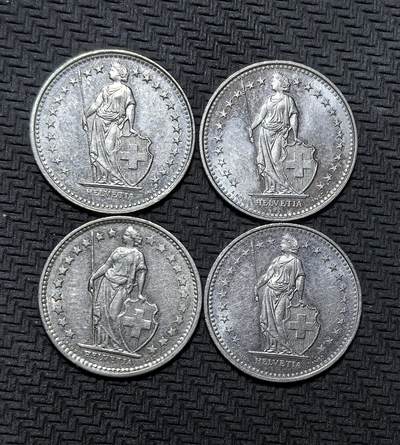 外国优质银币克朗币纪念章，每周六晚九点倒数截拍，满百包邮可寄存，持续收拍 - 瑞士联邦 1/2 法郎4枚，含 1975、1991、1992、1993 年版，币面为守护女神海尔维蒂亚与十字盾徽，是瑞士经典流通辅币，见证其长期中立与金融稳定。