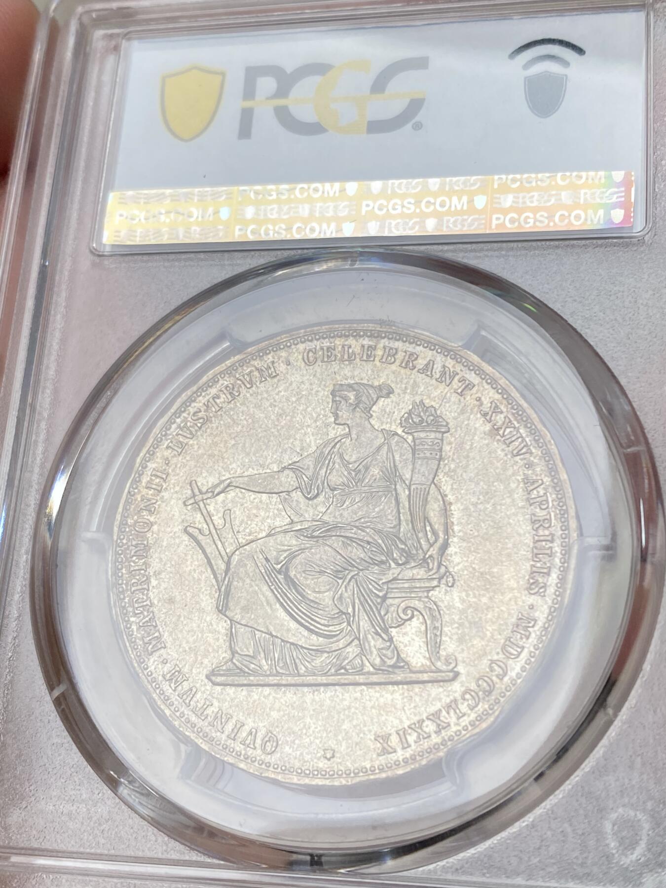 万国钱币拍卖第064期 PCGS MS61 1879年奥地利佛朗茨一世与茜茜公主银婚纪念2福林银币 超经典品种 原味晚霞淡彩霜感十足