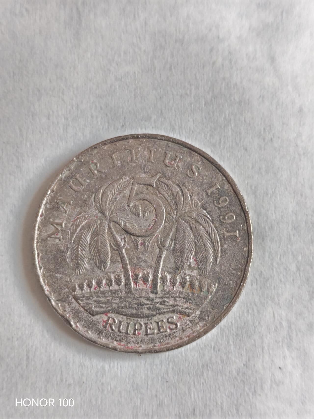 纪念章/纪念币 毛里求斯1991年5卢比- 该版5卢比硬币是毛里求斯独立后发行的经典流通币，以拉姆古兰爵士为固定肖像，仅年份和工艺有细微变化