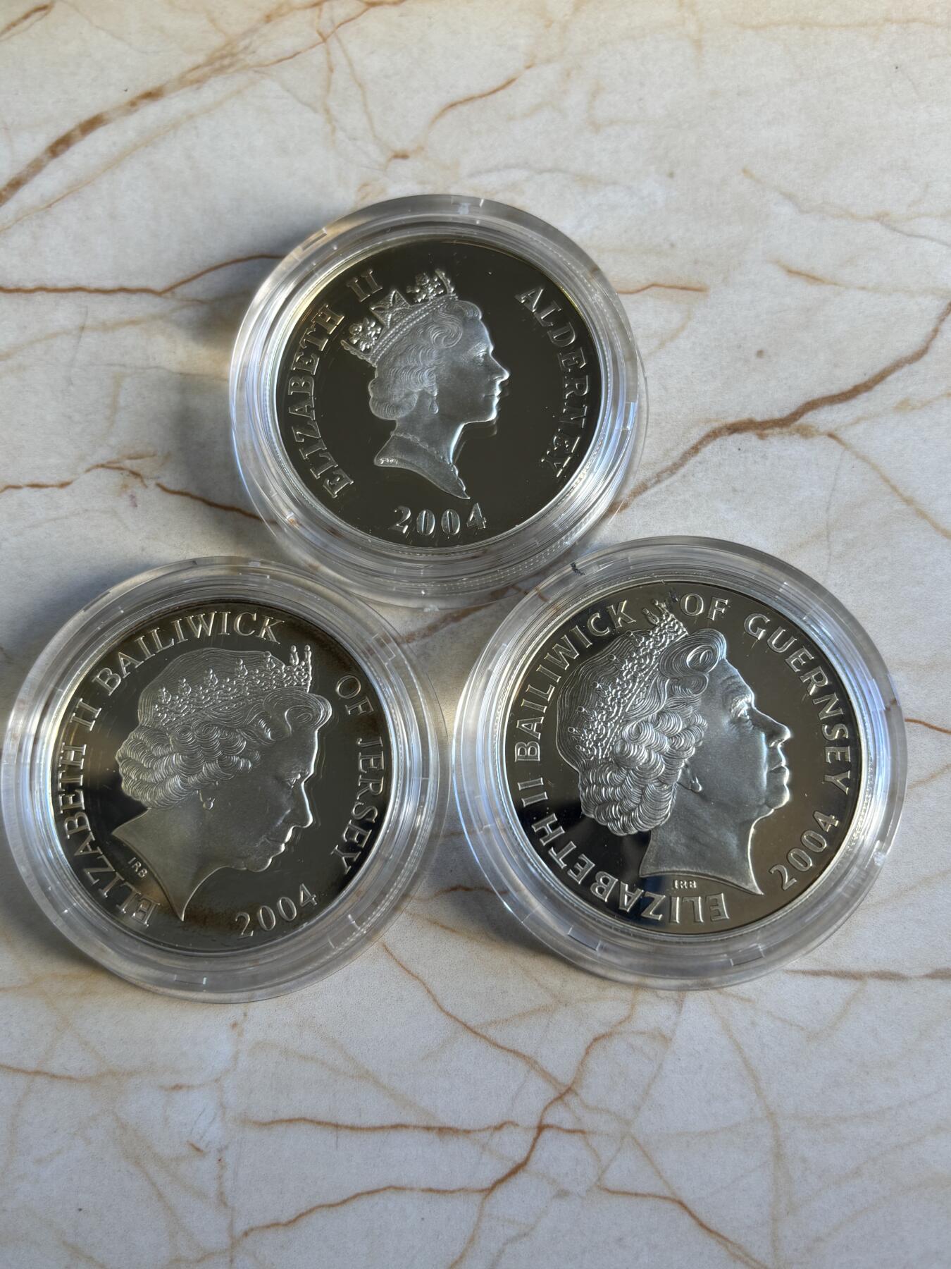 第196期拍卖 泽西根西奥尔德尼2004年诺曼底登陆纪念银币3枚套，925银，28.28克*3，发行25000套，有氧化