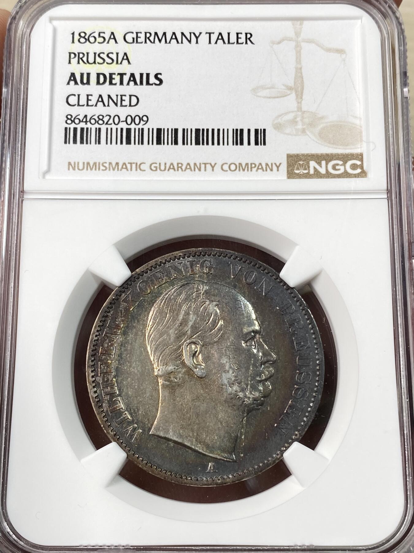万国钱币拍卖第064期 NGC AUD 1865年德国普鲁士威廉一世帝国鹰流通1泰勒 经典德国一手老藏酱五彩包浆
