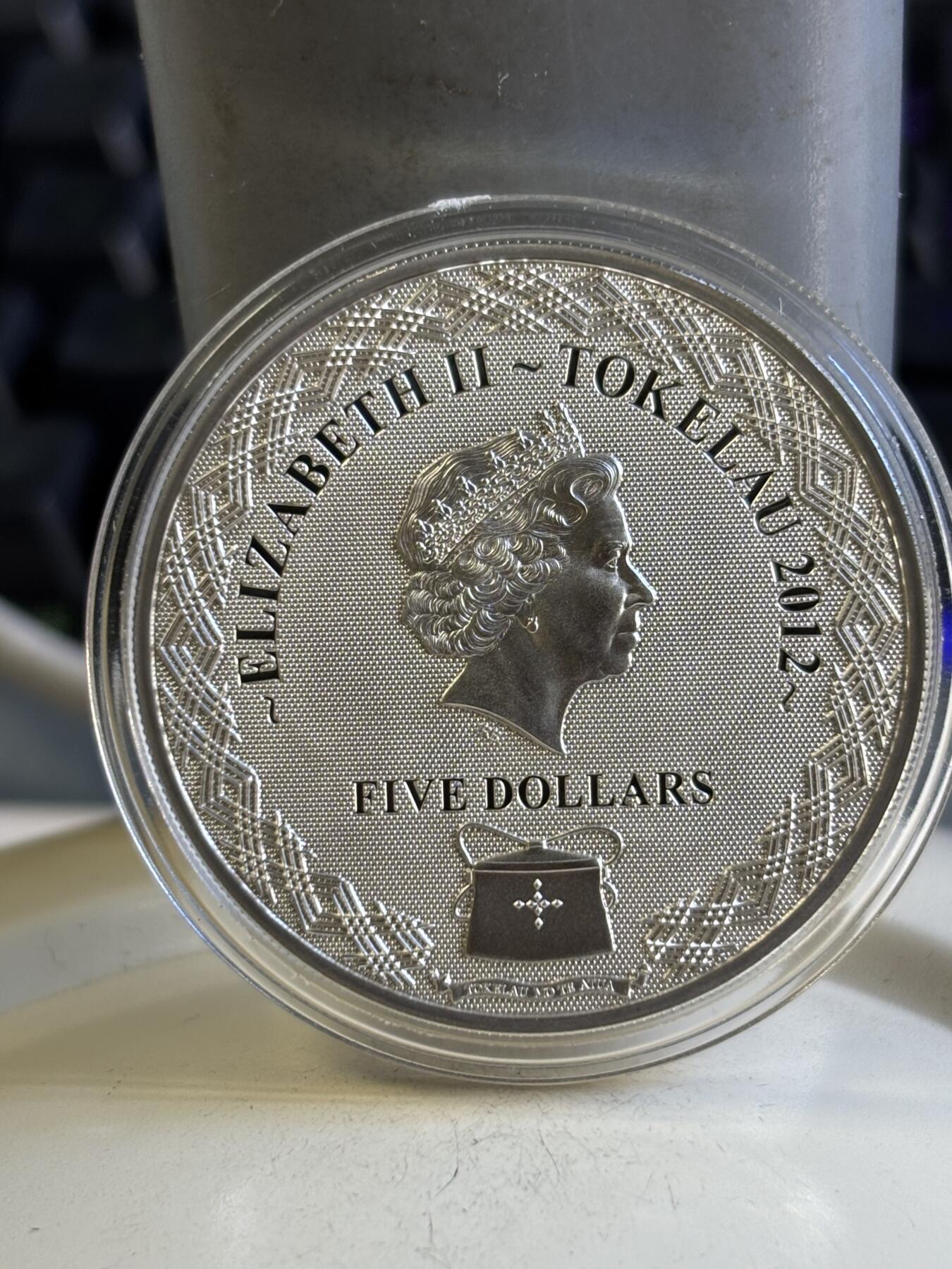 第196期拍卖 托克劳2012年和平与爱幻彩纪念银币，925银，25克，发行2500枚