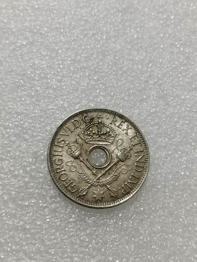 天下钱庄专场欢迎参拍 - 新几内亚中孔银币