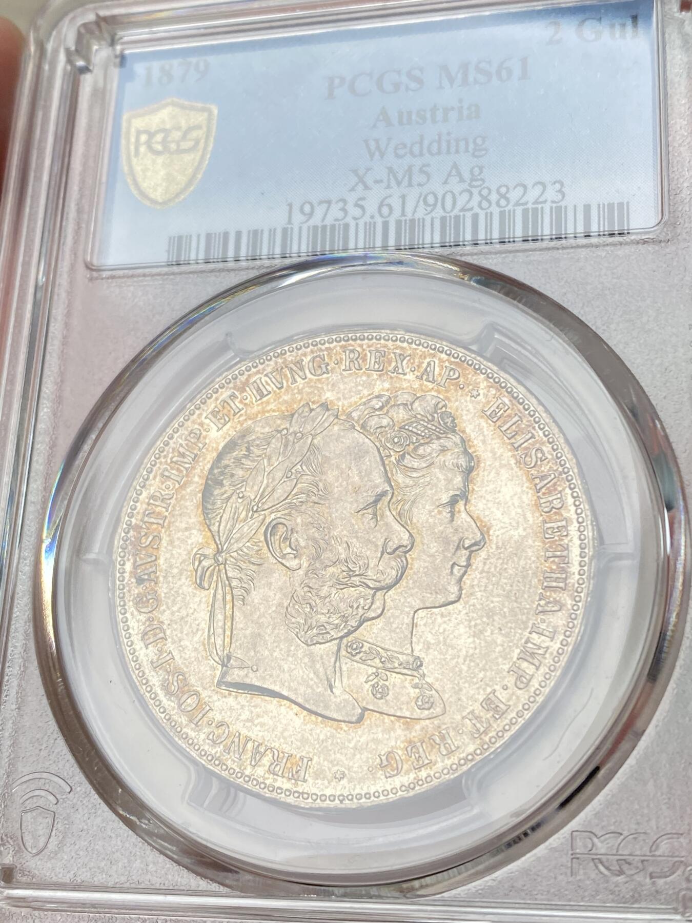 万国钱币拍卖第064期 PCGS MS61 1879年奥地利佛朗茨一世与茜茜公主银婚纪念2福林银币 超经典品种 原味晚霞淡彩霜感十足