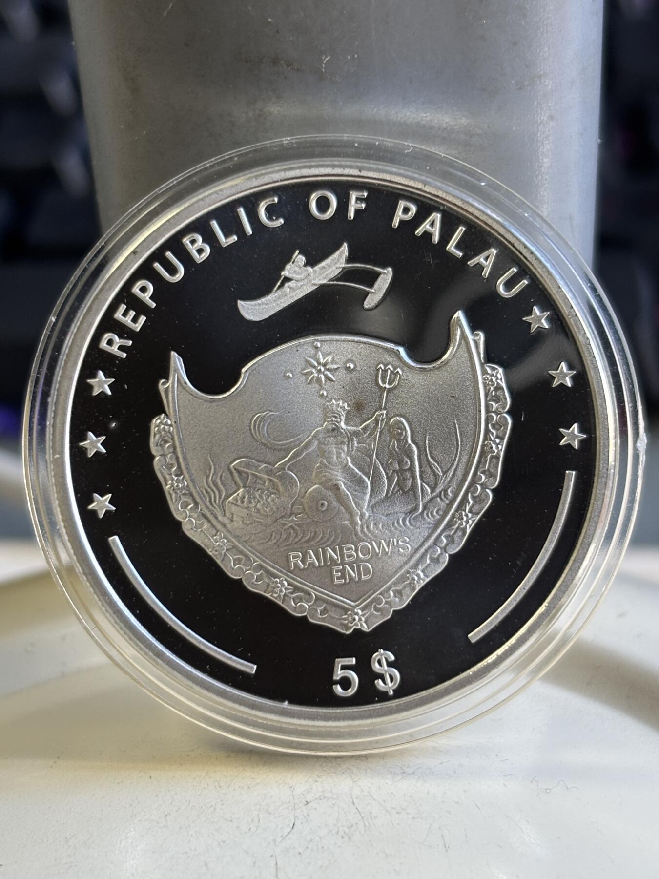 第196期拍卖 帕劳2007年珍珠系列镶嵌天然黄珍珠精制纪念银币，925银，25克，发行2500枚，有氧化，