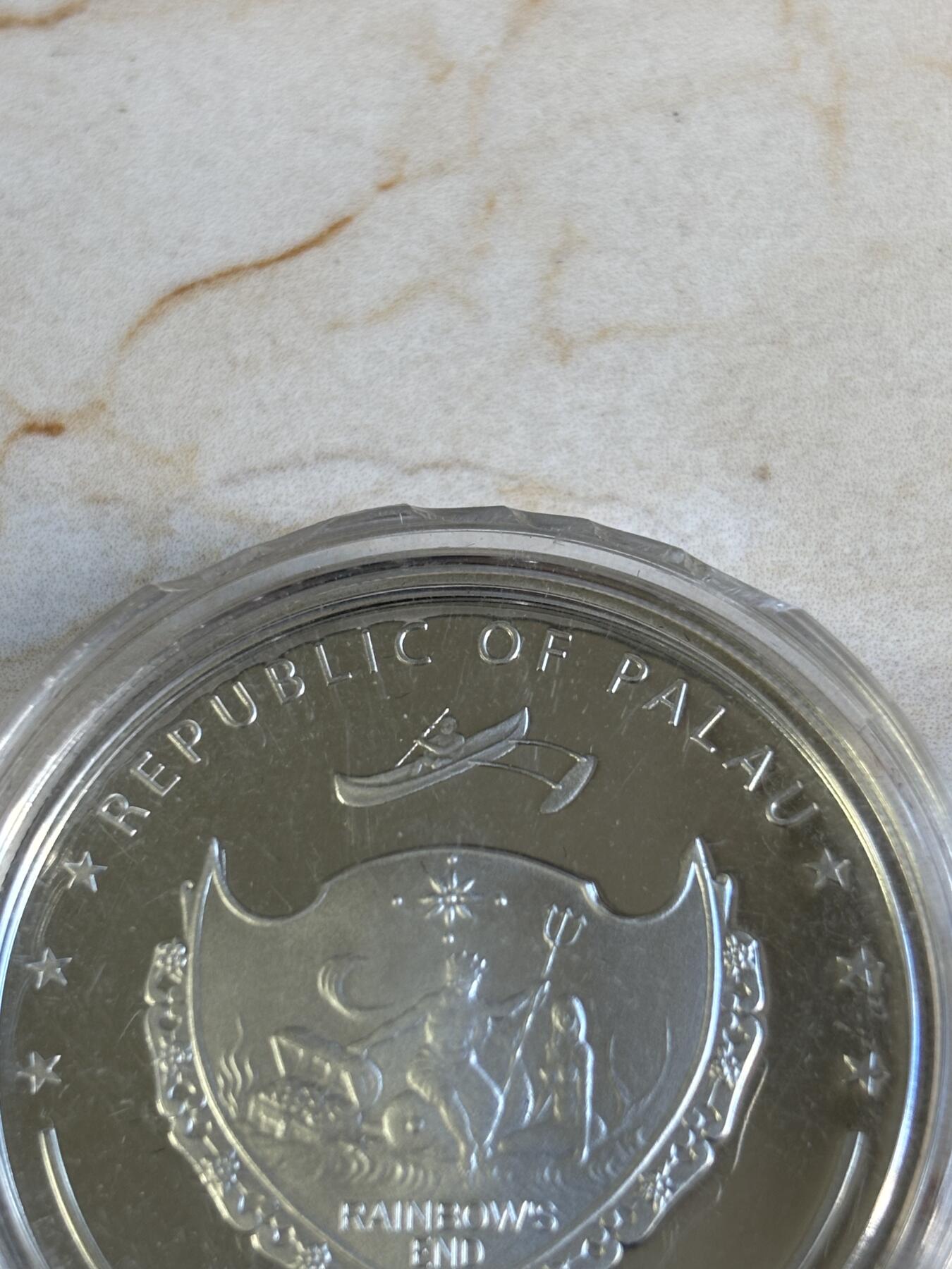 第196期拍卖 帕劳2010年麦金利山脉与花卉系列彩色纪念银币，925银，25克，塑料盒有破