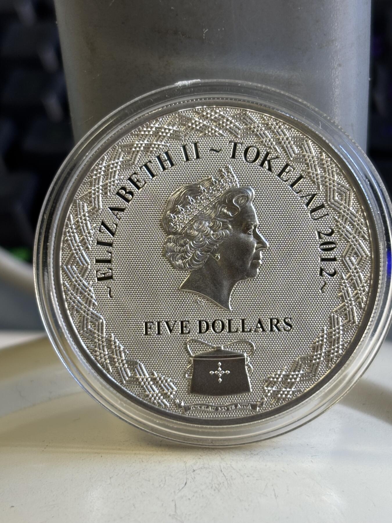 第196期拍卖 托克劳2012年和平与爱幻彩纪念银币，925银，25克，发行2500枚