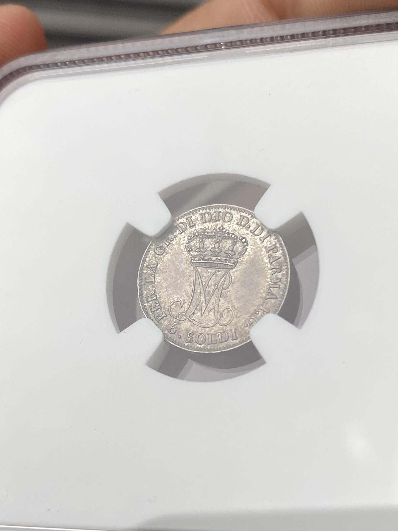 万国钱币拍卖第064期 NGC MS63 1815年意大利帕尔马5索尔迪银币 拿皇夫人帕尔马女大公玛丽亚·露易丝 双面均匀欧陆五彩环绕 国际市场广受欢迎的品种 典藏级品质不可错过