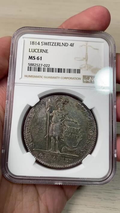 万国钱币拍卖第064期 NGC MS61 1814年瑞士联邦卢瑟恩雇佣兵4法郎大银币 经典瑞士雇佣兵系列 原味深五彩火烧云倒影包浆美轮美奂收藏级 潜力品种