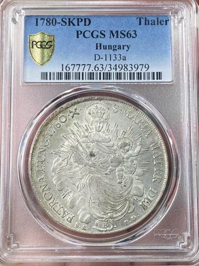 万国钱币拍卖第064期 - PCGS MS63 1780年匈牙利神圣罗马帝国皇帝约瑟夫二世圣母抱婴泰勒 克雷姆琴察造币厂铸 高品罕见的神罗匈牙利洗礼 PC亚军分更高仅一枚 圣光环绕着圣母与圣子 背面两位大天使献上祝福 超级深铸银光充沛无减重痕罕见典藏级