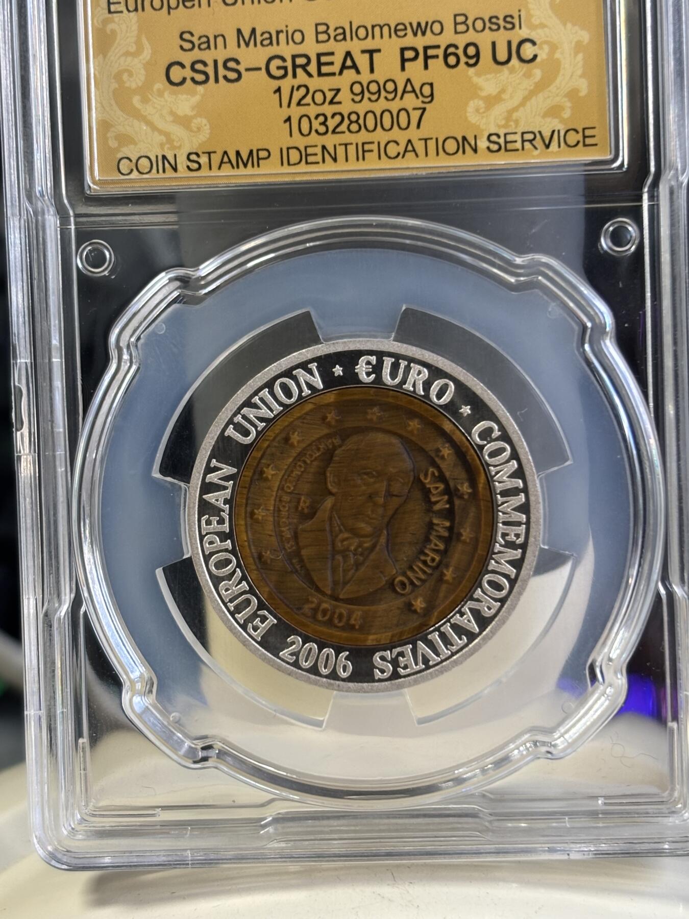 第197期拍卖 朝鲜2006年圣马力诺镶嵌虎眼石银币信泰评级69分，15.5克，发行3000枚