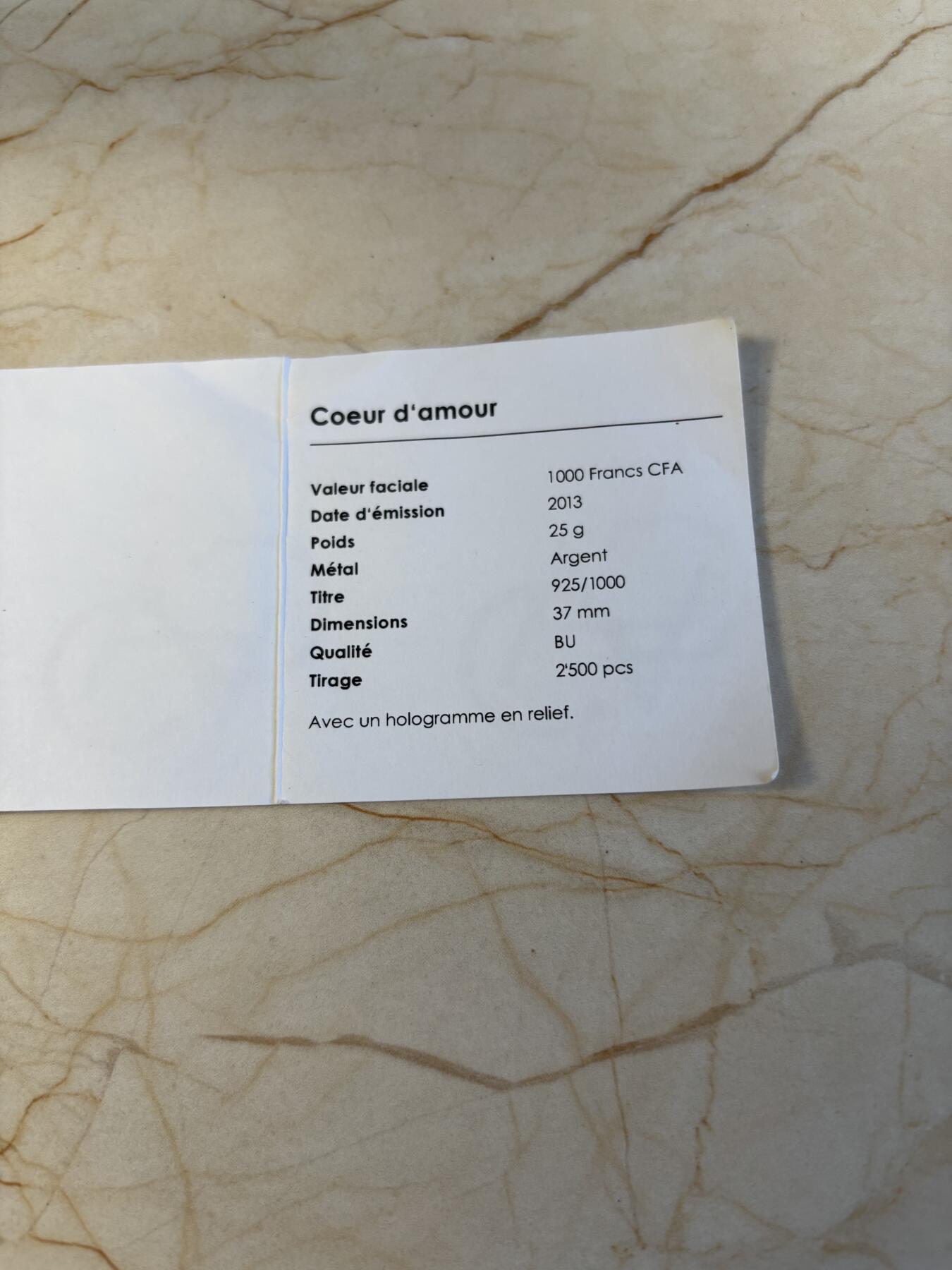 第196期拍卖 喀麦隆2013年天使之爱高浮雕全息幻彩心形纪念银币带证书，925银，发行2500枚