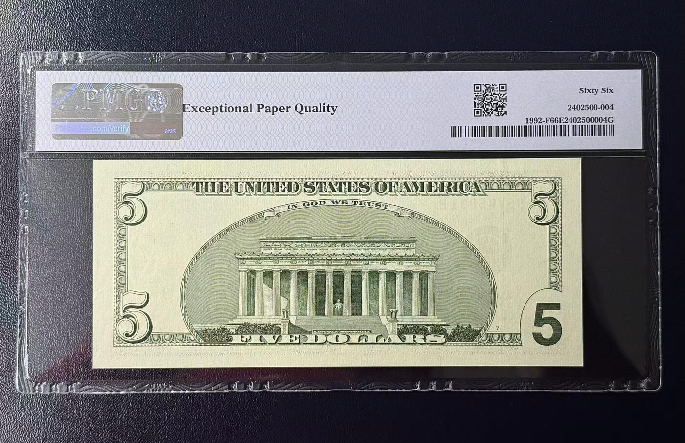 《外钞收藏家》第六百二十四期（精品场）（长期征集拍品、欢迎藏友们联系合作） 2006版大头5美元PMG 66分EPQ星条旗标签。