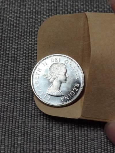 卷拆1963年加拿大伊丽莎白二世驯鹿25分银币 - 卷拆1963年加拿大伊丽莎白二世驯鹿25分银币