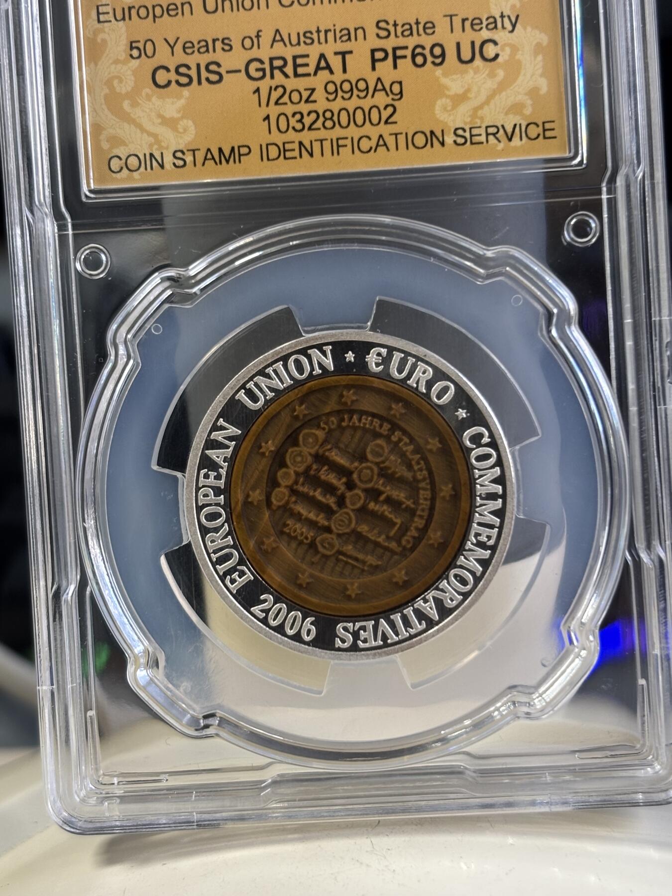 第197期拍卖 朝鲜2006年奥地利镶嵌虎眼石纪念银币信泰评级69分，15.5克，发行3000枚