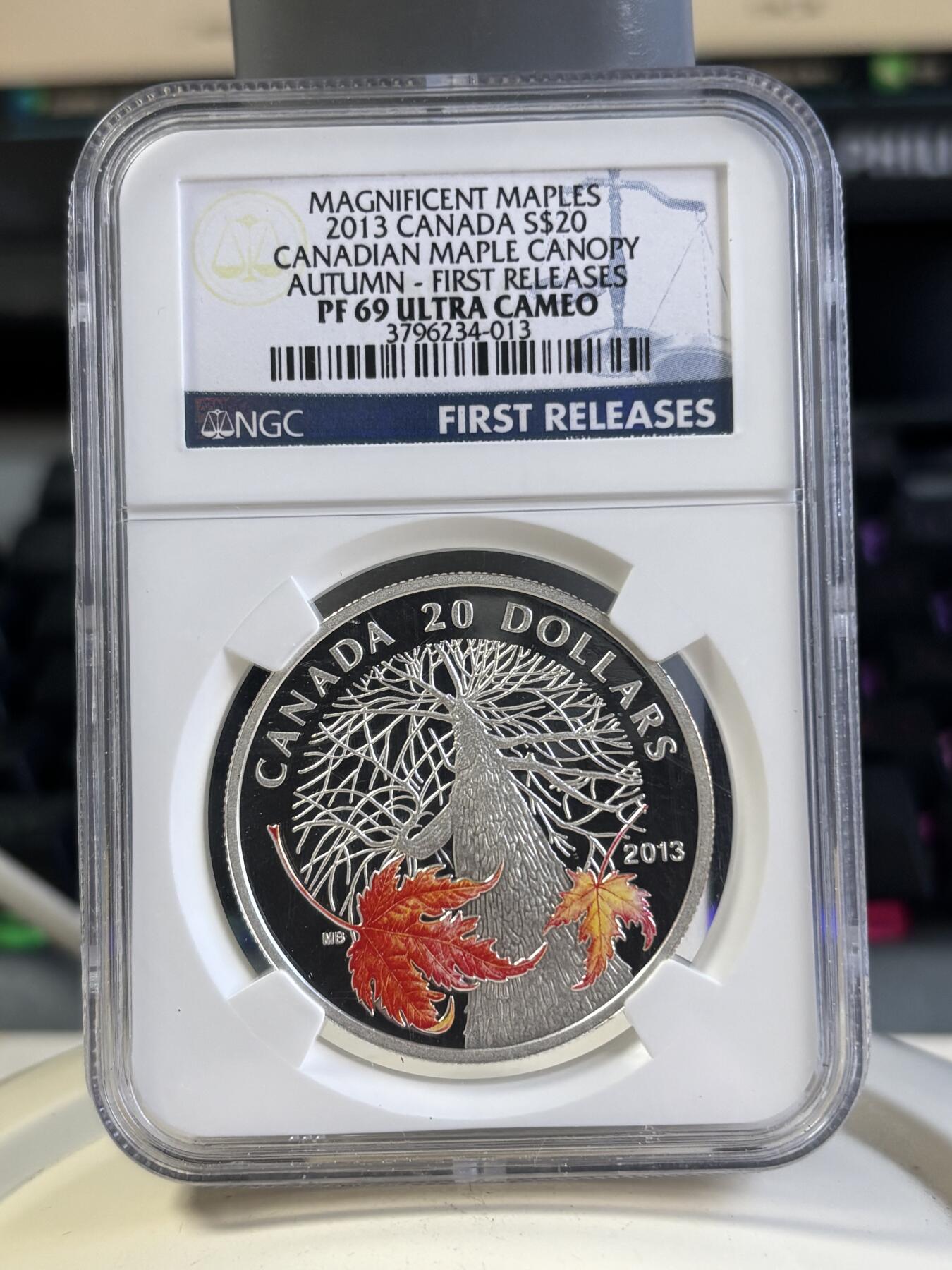 第197期拍卖 加拿大2013枫叶树冠系列秋天银币NGC-PF69首期标无盒证书，9999银，发行7500枚
