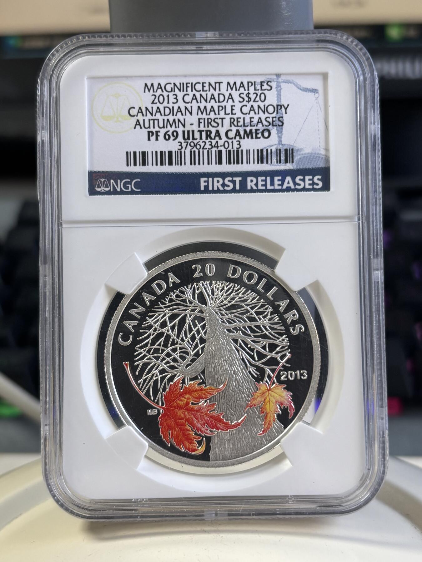 第197期拍卖 加拿大2013枫叶树冠系列秋天银币NGC-PF69首期标无盒证书，9999银，发行7500枚