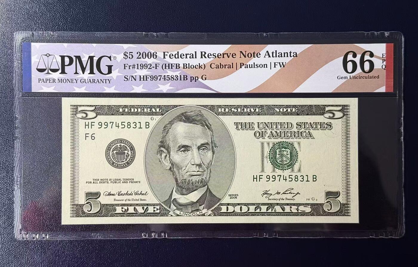 《外钞收藏家》第六百二十四期（精品场）（长期征集拍品、欢迎藏友们联系合作） 2006版大头5美元PMG 66分EPQ星条旗标签。