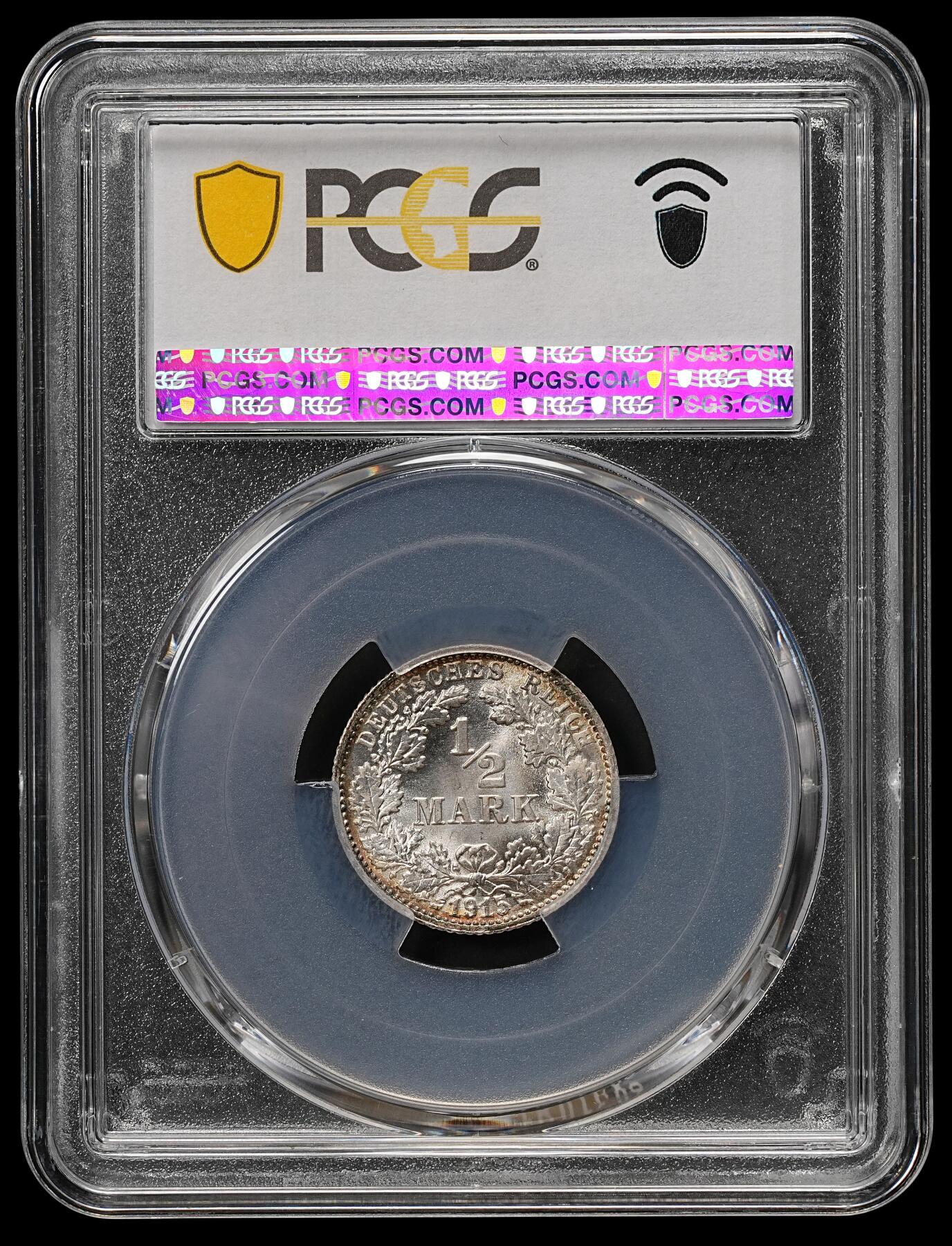 修遠堂世界钱币第110期 PCGS MS66 1915年德国1/2马克银币，F厂铭，同一原卷头一次送评级都是67-68，这次送惨被压分，这枚绝不止66的状态，环彩