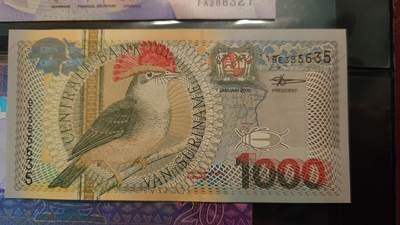 世界钱币～微拍第243期暨2026年第24期  老库存每款各1-2张清仓低价起拍 - 2000年苏里南1000 全新绝品无47尾号635