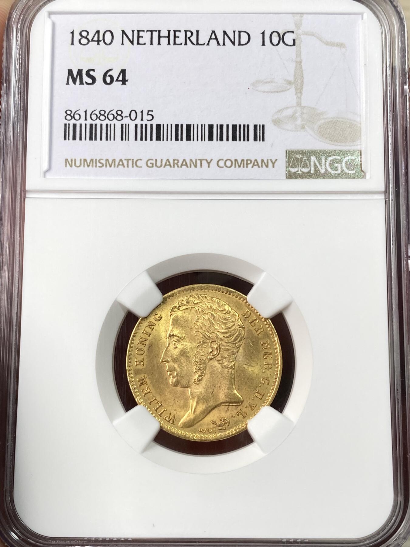 万国钱币拍卖第064期 NGC MS64 1840年荷兰王国威廉一世10盾金币 高品罕见的早期荷兰金币 全深打丝绸金光环绕 不可多得的收藏级品质 6.73g 900金