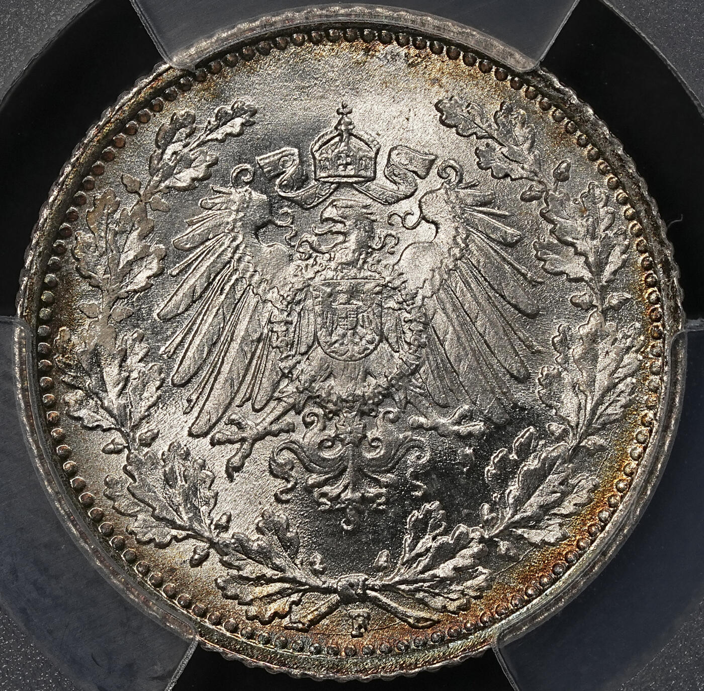 修遠堂世界钱币第110期 PCGS MS66 1915年德国1/2马克银币，F厂铭，同一原卷头一次送评级都是67-68，这次送惨被压分，这枚绝不止66的状态，环彩